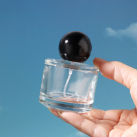 Vente en gros de luxe flacon de parfum unique de 30ml 50ml 100ml avec capuchon sphérique emballage en verre