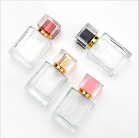 Paquet de bouteille de parfum de jet de luxe de 50ml bouteilles d'emballage cosmétiques transparentes flacon en verre de parfum