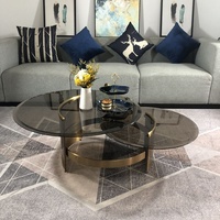 Ensemble de table basse de luxe moderne avec cadre doré en acier inoxydable personnalisé avec plateau en verre rond