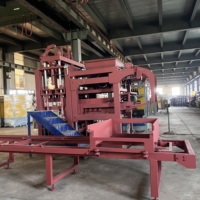 Machine automatique de fabrication de blocs de béton haute pression QT15-15 avec contrôle PLC pour la production de pavés creux et pleins