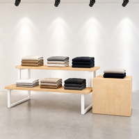 Table de présentation en bois à deux niveaux, noire, avec pieds en U, présentoir de vêtements pliable pour îlot commercial, socle pour logo, vente en gros