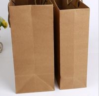 Sac cadeau de luxe personnalisable en papier kraft avec poignée en corde de coton et soufflet de fond pour vêtements, prix négociable