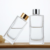 Diffuseur de parfum d'ambiance carré à bâtonnets d'huiles essentielles, bouteille en verre écologique avec logo personnalisé, prix usine