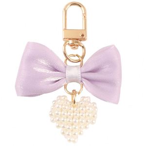 <b>Sweet</b> BowKnot Keychain Butterfly Knot Imitated Pearl String Key Chain Phone Charms Bag Strap Cellphone Cellphone Lanyard Keyring - Product Image 4