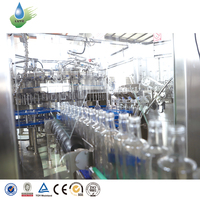 Machine de remplissage de boissons gazeuses en bouteille de verre, ligne de remplissage d'eau gazeuse