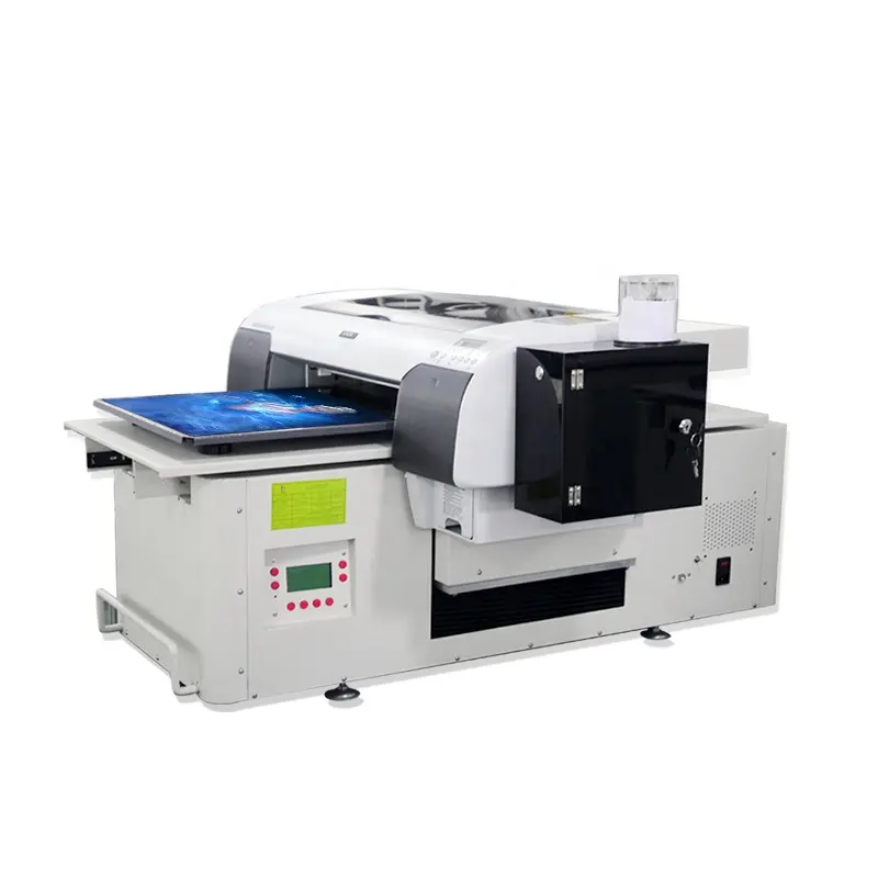 Fácil operación Manual pequeño 17 pulgadas M2 DTG impresora de cama plana con Color para la camiseta, ropa de tela de impresión de algodón