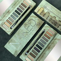 Palette de fards à paupières smoky 12 couleurs en gros – Tons chauds terre et noir, mats, irisés, pailletés, haute pigmentation, maquillage pour les yeux d'Halloween