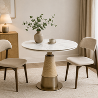 Japandi Weißer Marmor Runder Tisch Designer Bistrotisch mit Goldener Konischer Säule für Luxus-Apartment Essbereich