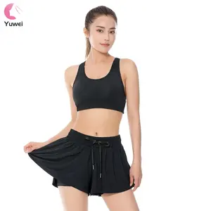 Conjunto Deportivo de Dos Piezas para Mujer con Falda de Tenis y Pantalones Cortos con Bolsillos, Ropa Fluida para Yoga - Product Image 1