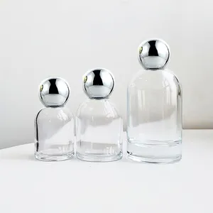 Botella de cristal vacía con forma redonda, botella de cristal de Perfume con tapa negra de lujo de 50Ml y 100Ml