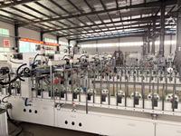 Machine à laminer électrique à haute efficacité pour profilés en aluminium, état neuf, pour l'enveloppement de portes et fenêtres, film bois-plastique