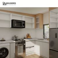 Cuisine sur mesure blanche en Australie, aménagement en L avec four et micro-ondes intégrés, conception modulaire pour la construction neuve en Nouvelle-Zélande