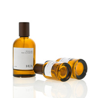 Flacon de parfum cylindrique en verre ambré moderne de haute qualité, en gros, 30 ml, 50 ml, 100 ml, avec bouchon en bois brun