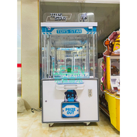Vente directe usine : Machine à griffes en métal à monnayeur avec interface anglaise pour jeu de distribution de prix d'amusement pour enfants