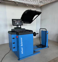 Équilibreuse de roues automatique pour camions avec auto-calibrage, mesure laser haute précision, machine robuste pour l'équilibrage des pneus de camions lourds