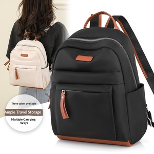 Mochila de tela Oxford de poliéster para mujer, nueva moda 2024, minimalista, informal, ligera, 20-35L, mochila escolar con hombro curvado - Product Image 1