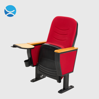 Chaises d'auditorium personnalisables en tissu plastique rembourré avec tablette d'écriture dissimulée, porte-gobelet et accoudoirs en bois pour théâtre et église