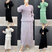 Ensemble décontracté deux pièces plissé minimaliste OEM d'usine, style Dubaï, couleur lavande unie, avec cardigan à franges et jupe midi