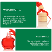 Désodorisant de voiture suspendu Diffuseur de parfum de voiture vide Bouteille en verre colorée en forme de pomme 8ml avec bouchon en bois