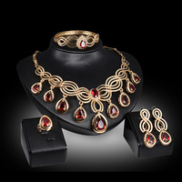 Ensemble de bijoux populaire : Collier, boucles d'oreilles et accessoires en alliage, ensemble quatre pièces exquis, luxueux et tendance avec pierres précieuses