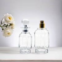 Fabricant sur mesure vente en gros 50ml 100ml atomiseur de pulvérisation en forme de cylindre rond fantaisie bouteille en verre de parfum vide