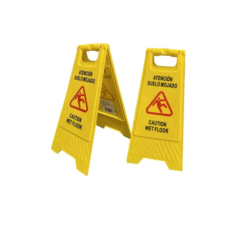 Yellow plastic wet floor warning sign