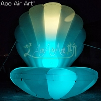 Elegante concha de OSTRA inflable con perla LED brillante para eventos de fiesta, cabina de DJ inflable y fondos de boda