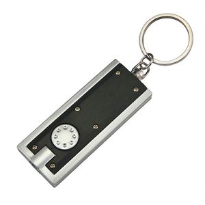 Vente en gros de porte-clés personnalisés avec lumière LED et interrupteur à bouton, cadeaux promotionnels, Krt005, torche de signature, porte-clés en stock - Product Image 2