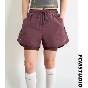 Shorts de <span class=keywords><strong>sport</strong></span> décontractés polyvalents deux-en-un pour hommes et femmes, légers, à taille élastique, séchage rapide, pour l'été et les activités de plein air – Vente en gros - Product Image 4