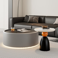 Table basse ronde crème française avec bandes lumineuses, idéale pour les petits salons, hôtels et appartements