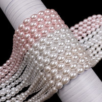Prêt à expédier : Brins de perles de verre de riz 6x8mm rose pâle, enfilés avec fil, pour la création d'œuvres d'art perlées élégantes et le sourcing DIY