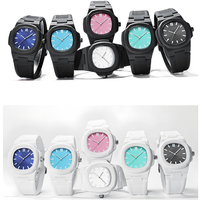 Nouvelle montre à quartz ronde pour couple, bracelet en silicone tendance, douze couleurs différentes, étanche et luminescente, vente en gros