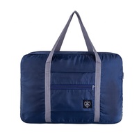 L'industrie Chine Vente en gros Sac de voyage Réutilisable Personnalisé RPET Sac de rangement pliable pour vêtements Sac pliable Voyage