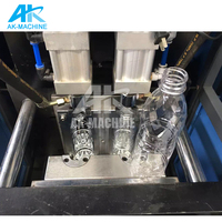 Machine de soufflage de bouteilles semi-automatique AK-32, deux souffleurs, un four, 2000 BPH, machine de moulage par étirage de bouteilles en plastique PET