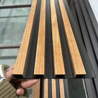 Haute qualité imperméable à l'eau WPC lamelle cannelée décorative WPC panneau mural Grain de bois PVC laminé panneau de plafond
