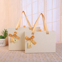 Sac cadeau beige personnalisé de luxe avec poignée, boîte d'emballage pour tiroir de magasinage