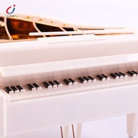 Chengji grand piano boîte à musique cadeau d'anniversaire instrument de musique jouet en plastique piano boîte à musique