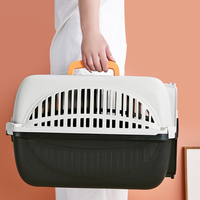 Cage de transport portable en plastique respirant pour animaux de compagnie (chiens et chats) en gros