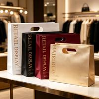 Sacs en papier découpés sur mesure de qualité supérieure avec fond renforcé pour emballage cadeau de boutiques et vente en gros