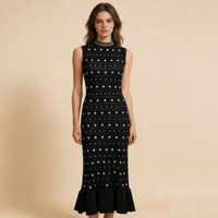 Robe longue d'été sans manches à col rond en tricot, style élégant, avec estampage à chaud et rivets, volants, nouvelle collection 2026, vente en gros