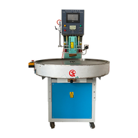 Machine de gaufrage et de soudage de semelles de chaussures à table rotative haute fréquence