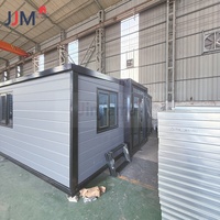 JJM 2 petites maisons conteneur de luxe extensibles de 4 chambres à coucher kits de cabane en rondins plat grand-mère de 40 pieds maison préfabriquée pour moteur d'immeuble de bureaux