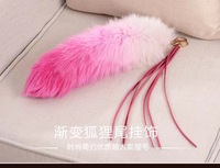 Vente en gros de porte-clés en queue de renard véritable de qualité du fabricant, accessoire coloré en peau de teint par cravate pour les vêtements de voitures nolisées personnalisées