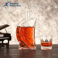 Bouteille en verre cylindrique transparente mate de qualité supérieure avec bouchon en bois personnalisé pour le stockage de la tequila et des spiritueux