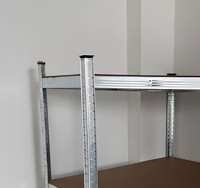 Étagère de rangement industrielle en acier durable à 4 niveaux en forme de L pour entrepôt et présentation en magasin