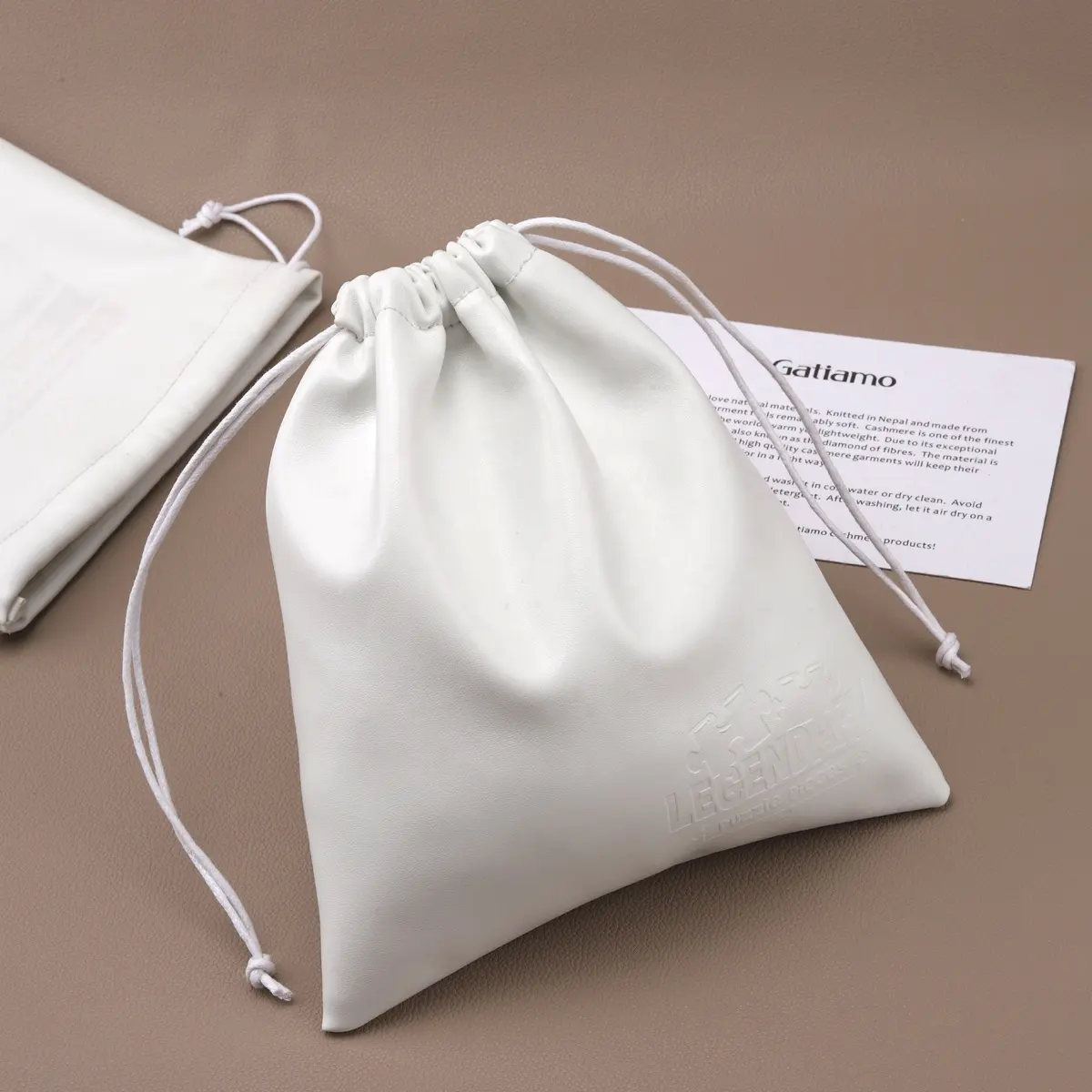 Custom Emboss Pu Leather Mobile Phone Charging Bank Storage Bag White Drawstring Leather Pouch