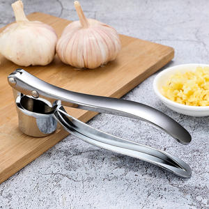 Fabricante de puré de ajo de cocina multifuncional Pinza de ajo de aleación de zinc creativa - Product Image 5