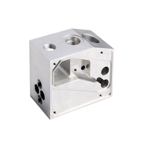 Service de fabrication CNC personnalisé à Dongguan, bloc de connexion carré multifonction en aluminium de précision