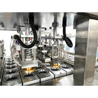 Machine de remplissage rotative pour eau, sauce, chocolat, crème glacée
