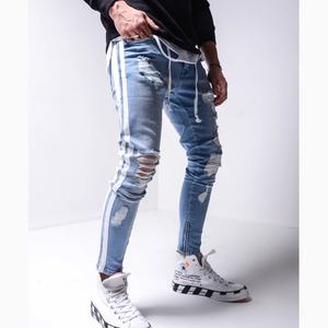 กางเกงยีนส์เดนิมทรงสกินนี่ขาดๆ แต่งซิปข้างสีน้ำเงินฟอก พร้อมแถบข้างสีขาว สำหรับผู้ชาย คุณภาพสูง ขายส่ง - Product Image 6